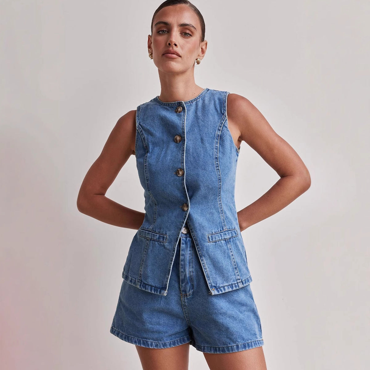 Fashionable sleeveless waist cinched high waisted loose denim shorts set