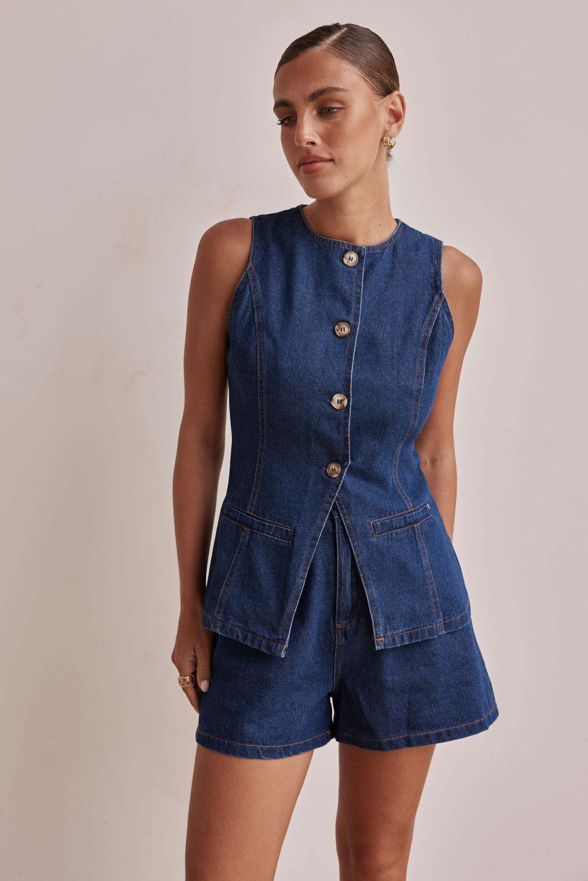 Fashionable sleeveless waist cinched high waisted loose denim shorts set