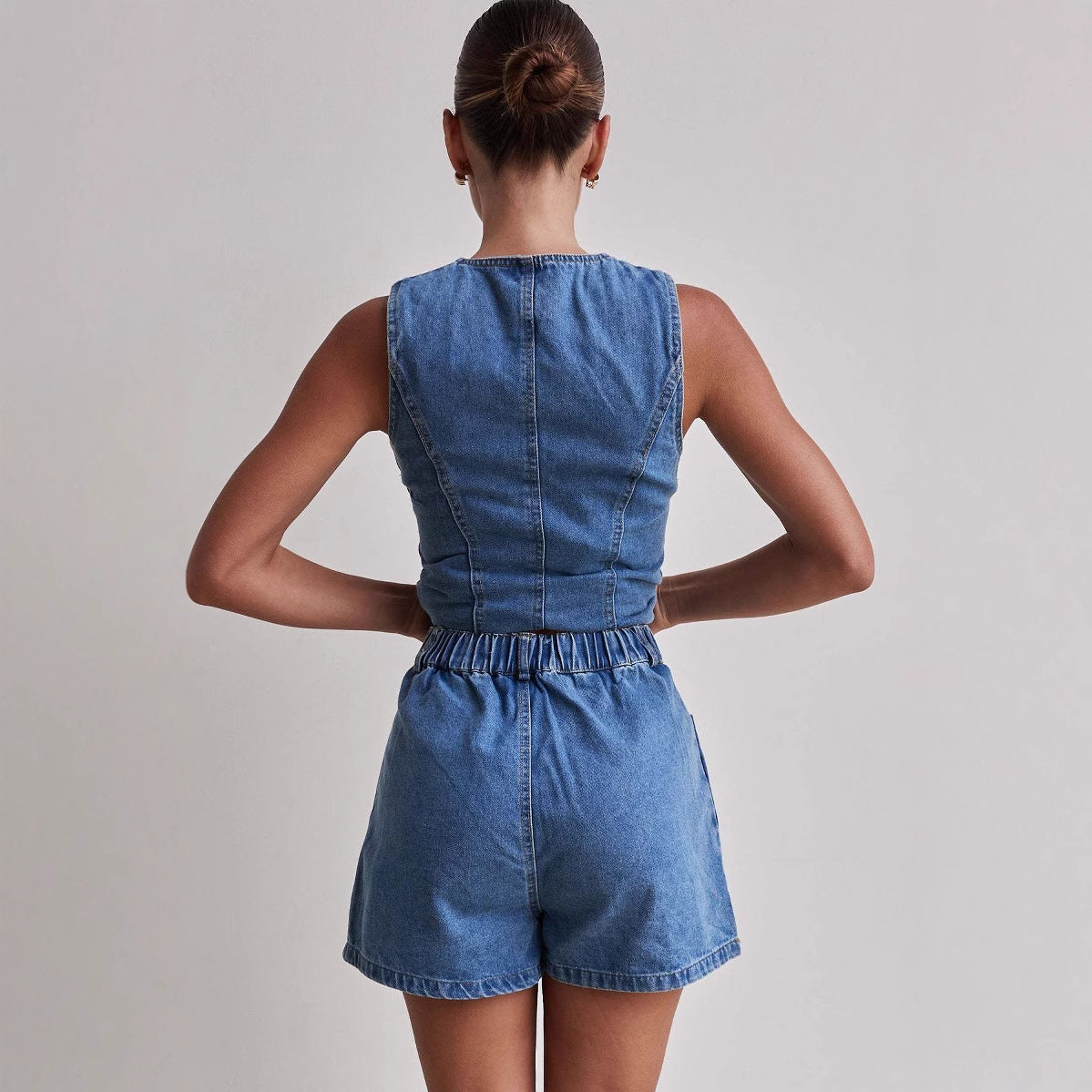 Fashionable sleeveless waist cinched high waisted loose denim shorts set
